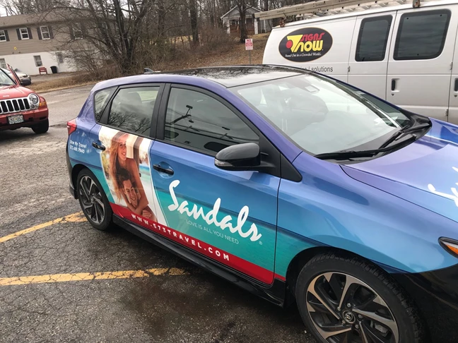 This car wrap was made for the company Sandals.