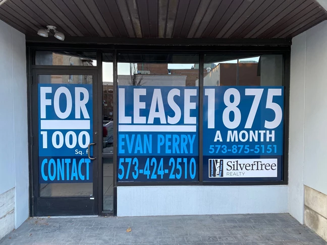 This compelling window sign was made for SilverTree Realty.